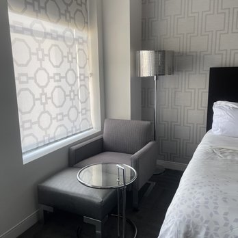 Renaissance Cincinnati Downtown Hotel - Chair next to window - Hotels Near Me - Cincinnati, Ohio Renaissance Cincinnati Downtown Hotel - Chair next to window - Hotels Near Me - Cincinnati, Ohio