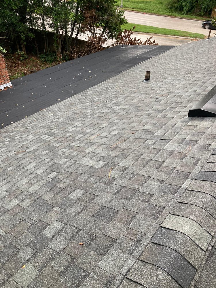 Slide of Payless Roofing