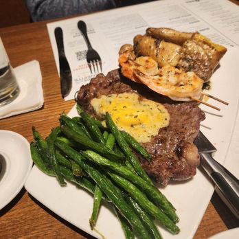 Kona Grill - Troy - Large steak and shrimp with roasted potatoes and green beans. Garlic butter on the steak. - Sushi Bars Near Me - Troy, Michigan Kona Grill - Troy - Large steak and shrimp with roasted potatoes and green beans. Garlic butter on the steak. - Sushi Bars Near Me - Troy, Michigan