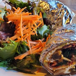 Village Coffee - Smash avocado wrap.
