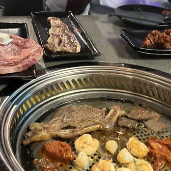 KPOT Korean BBQ & Hot Pot - Order from the tablet and cook right at the table. This pic has my shrimp and scallop. Hubby's meat - Korean Near Me - Wappingers Falls, New York KPOT Korean BBQ & Hot Pot - Order from the tablet and cook right at the table. This pic has my shrimp and scallop. Hubby's meat - Korean Near Me - Wappingers Falls, New York