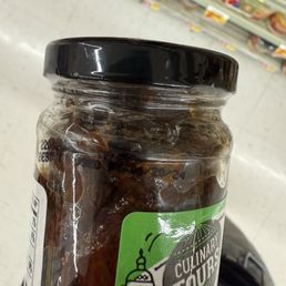 Expired jar of sun-dried tomatoes, date says 6/20/204