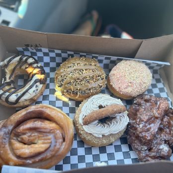 Carl’s Donuts - Cannoli donut, Samoa donut, strawberry cheesecake, Apple fritter, snickerdoodle, and a cinnamon roll - Donuts Near Me - Las Vegas, Nevada Carl’s Donuts - Cannoli donut, Samoa donut, strawberry cheesecake, Apple fritter, snickerdoodle, and a cinnamon roll - Donuts Near Me - Las Vegas, Nevada