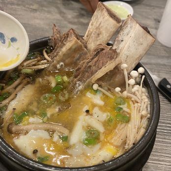 District 5 - Stone bowl soup, beef rib, some sort of mushroom, glass noodle and a poach egg. Ya that was good! - Noodles Near Me - Lake Forest, California District 5 - Stone bowl soup, beef rib, some sort of mushroom, glass noodle and a poach egg. Ya that was good! - Noodles Near Me - Lake Forest, California
