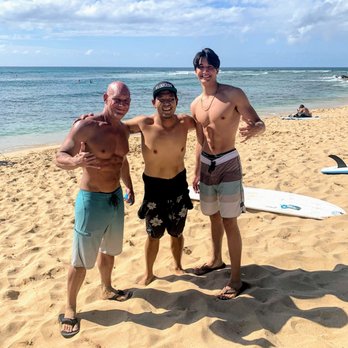 North Shore Banzai Surf School - Post session picture with man, Kalani. - Surf Schools Near Me