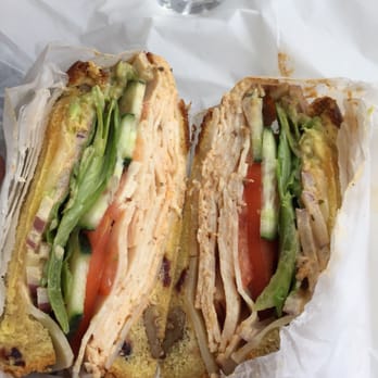Yo-Way Eatery - Toasted cranberry & walnut bread with Cajun mayo, Swiss cheese, chicken, lettuce, tomato, red onion, cucumber, banana peppers, and avocado! - Juice Bars & Smoothies Near Me - Gardena, California