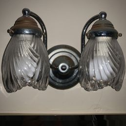 Dirty rusted light fixture in restroom Dirty rusted light fixture in restroom