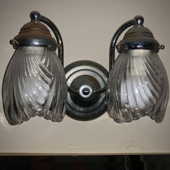 The Tides - Dirty rusted light fixture in restroom - Hotels Near Me - Laguna Beach, California The Tides - Dirty rusted light fixture in restroom - Hotels Near Me - Laguna Beach, California