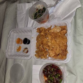 Hanai Hawaiian BBQ - 1/4 lb Shoyu poke Deconstructed Ahi Poke nachos (you're supposed to mix it, but it's more fun to load each chip just before you eat it) - Asian Fusion Near Me - Buffalo, New York