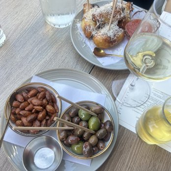 Propaganda Wine Bar - Outdoor Seating - almonds, olives, stuzzichini with squash blossom and mozzarella served with marinara sauce - happy hour white - Wine Bars Near Me - Los Angeles, California Propaganda Wine Bar - Outdoor Seating - almonds, olives, stuzzichini with squash blossom and mozzarella served with marinara sauce - happy hour white - Wine Bars Near Me - Los Angeles, California