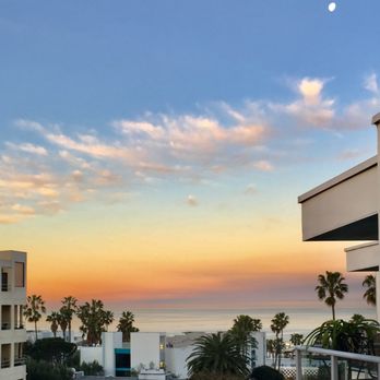 Ocean Club - Another sunset photo with a moon on right upper corner - Apartments Near Me - Redondo Beach, California Ocean Club - Another sunset photo with a moon on right upper corner - Apartments Near Me - Redondo Beach, California
