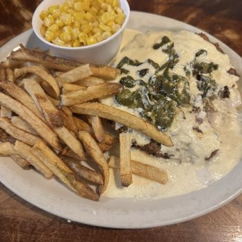 Green Chile Willy's Grill - Jalapeño gravy, chicken fried steak minus the cheddar cheese, french fries, and fried sweet corn. - Steakhouses Near Me - Amarillo, Texas Green Chile Willy's Grill - Jalapeño gravy, chicken fried steak minus the cheddar cheese, french fries, and fried sweet corn. - Steakhouses Near Me - Amarillo, Texas