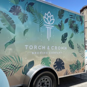 Torch & Crown Brewing - a truck parked in front of a building - Beer Gardens Near Me - New York, New York Torch & Crown Brewing - a truck parked in front of a building - Beer Gardens Near Me - New York, New York
