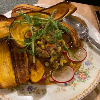 PORT UNION - Aquacate -- that's corn salad in a half avocado with baked strips of plantain on the side. - Gluten-Free Near Me - Chicago, Illinois PORT UNION - Aquacate -- that's corn salad in a half avocado with baked strips of plantain on the side. - Gluten-Free Near Me - Chicago, Illinois