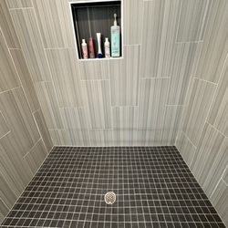 The Grout Genie - Primary shower floor with improved grading