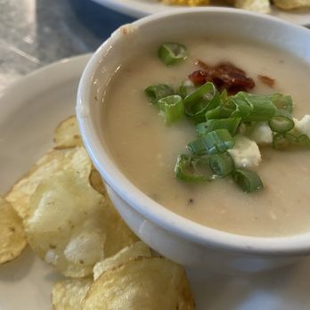 The Dove's Nest - Baked potato soup with goat cheese, bacon and scallions. - New American Near Me - Waxahachie, Texas