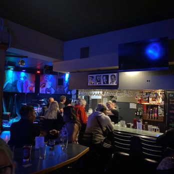 Blue Diamond - a group of people sitting at a bar - American Near Me - Portland, Oregon Blue Diamond - a group of people sitting at a bar - American Near Me - Portland, Oregon