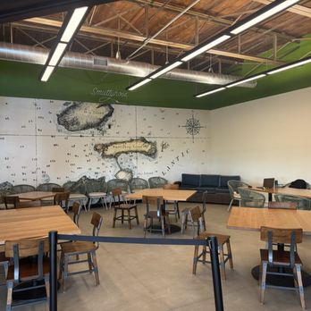Harpoon Brewery - This was the semi private area not in use, cool decor on the wall. - Brewpubs Near Me - Manchester, New Hampshire