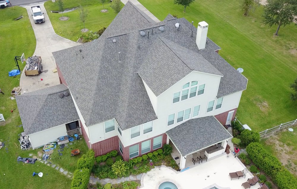 Slide of The Woodlands Premier Roofing