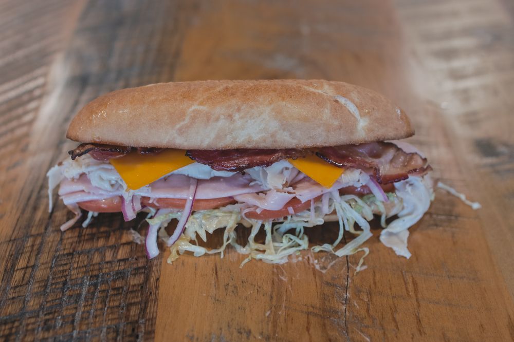 Mane Course Sandwiches Logo