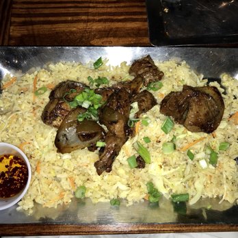 Hughie's - Shaking beef fried rice (chili oil on side) - Vietnamese Near Me - Houston, Texas