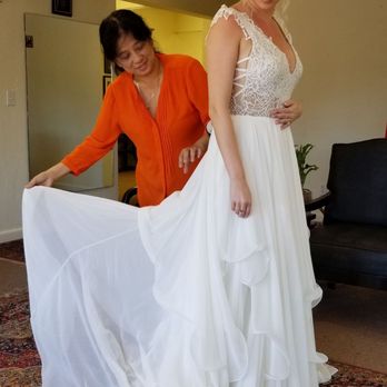 The Seamstress - Nancy is taking care of a customer during a fitting session - Bridal Near Me - Winter Park, Florida The Seamstress - Nancy is taking care of a customer during a fitting session - Bridal Near Me - Winter Park, Florida