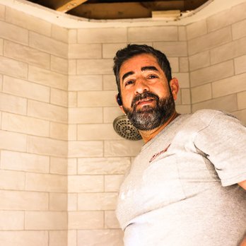 Plumbing Express - Fixing sheetrock in a really nice shower after a repipe. - Plumbing Near Me - Atlanta, Georgia