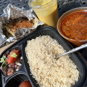 Chit Chaat Cafe - Chicken tikka masala with side of pindey chole, the Garlic Naan and Mango Lassi are AMAZING - Cafes Near Me - Vienna, Virginia
