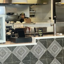 Verde Mexican Rotisserie - The sitting burrito! It was a pork burrito.