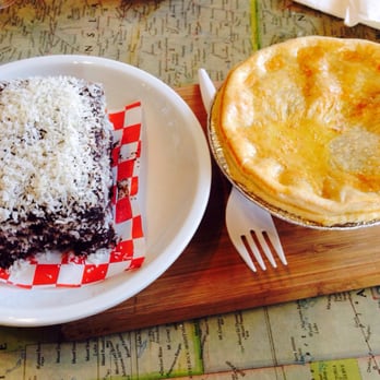 The Kookaburra - Aussi pie on right and Lamington on left. Both very good! - Coffee & Tea Near Me - St. Augustine, Florida