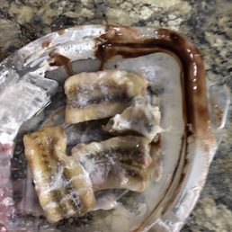 Black, slimy , over ripe , beyond edible bananas in banana split. Black, slimy , over ripe , beyond edible bananas in banana split.