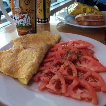 Le Cafe De Paris - Chantel's Omellette was one of the most delicious omellettes I've ever had. Thin slices of shaved ham and Swiss cheese. Perfect! - Coffee & Tea Near Me - Orlando, Florida