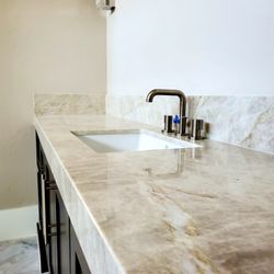 Golden Owl Stone - Taj Mahal Quartzite master bathroom countertop, Mitered Edge Detail, undermount sink