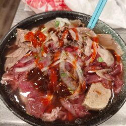 Pho dac biet for takeout! Just wait for the hot soup to cook up the rare meat :)