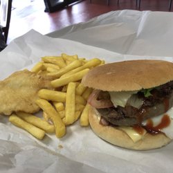 Eurasia Gourmet Takeaways - The works burger with a single order of chips and one piece of fish.