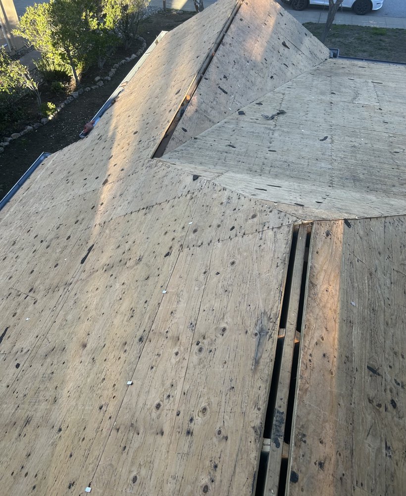 Slide of East Bay Roofing