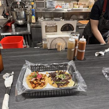 Santa Masa Tamaleria - Left: Red chorizo con potato taco Right: Cecina taco - Mexican Near Me - Chicago, Illinois Santa Masa Tamaleria - Left: Red chorizo con potato taco Right: Cecina taco - Mexican Near Me - Chicago, Illinois