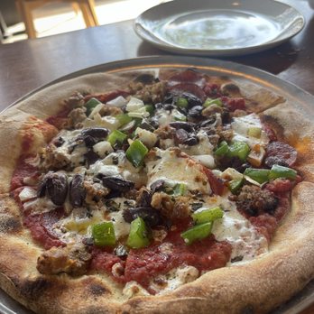 Monkeypod Kitchen - My husband and son shared the pizza!! They said it was good! - Hawaiian Near Me - Kapolei, Hawaii