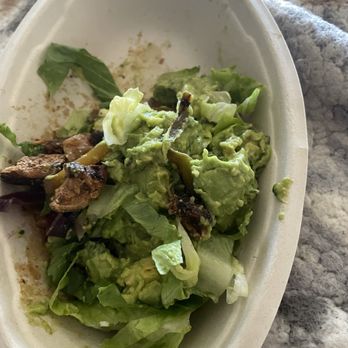 Chipotle Mexican Grill - Happy anniversary order of burnt chicken, unripe avocado and a few strands of lettuce and a few slivers of veg. Horrible - Mexican Near Me - La Jolla, California