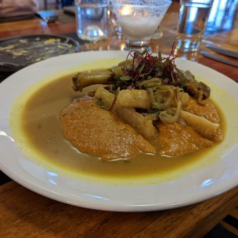Aji Restaurant - Pato (duck leg with yucca, sweet potato, in Amarillo sauce) - Latin American Near Me - Taos, New Mexico