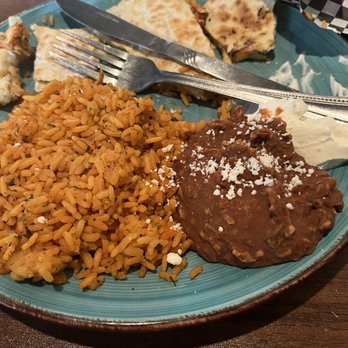 Papi Grande's - Those are supposed to be beans with rice. Looks like canned dog food. - Mexican Near Me - Amherst, New York