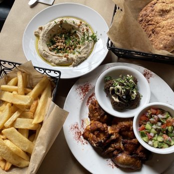 Oren's Hummus - Chicken skewer platter (falafel, Israeli salad), Jaffa hummus, fries, white pita (came with) - Mediterranean Near Me - San Francisco, California Oren's Hummus - Chicken skewer platter (falafel, Israeli salad), Jaffa hummus, fries, white pita (came with) - Mediterranean Near Me - San Francisco, California