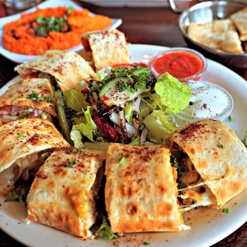 Cafe Turko - Chicken Beyti Kebab: grilled chicken cubes in lavash bread with mozzarella, feta cheese and vegetables ($14). Muhammara dip in back ($8). - Halal Near Me - Seattle, Washington Cafe Turko - Chicken Beyti Kebab: grilled chicken cubes in lavash bread with mozzarella, feta cheese and vegetables ($14). Muhammara dip in back ($8). - Halal Near Me - Seattle, Washington