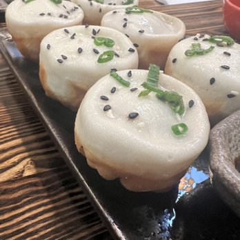 Dumpling Hours - Juicy Pan-Fried Pork Buns.  Bite w caution as the juice may splatter to your neighbors!! (you'll know what I mean) - Dim Sum Near Me - Walnut Creek, California