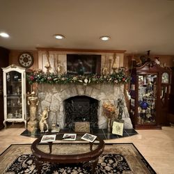 Fleur De Lac European Inn - The amazing fireplace and mantle in the main parlor