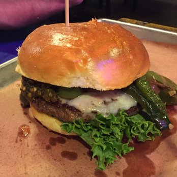 LSA Burger - Los Lonely with green Chile's and pepper jack cheese 9$. Has a side of Copperhead lode for additional 2$. - Cocktail Bars Near Me - Denton, Texas LSA Burger - Los Lonely with green Chile's and pepper jack cheese 9$. Has a side of Copperhead lode for additional 2$. - Cocktail Bars Near Me - Denton, Texas