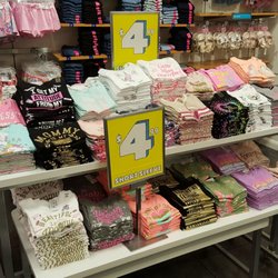 The Children's Place - Sale table of graphic tees