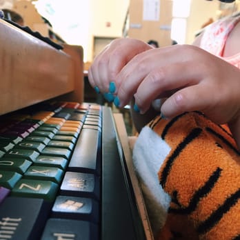 Murrieta Public Library - Little one on the toddler computers - Libraries Near Me - Murrieta, California