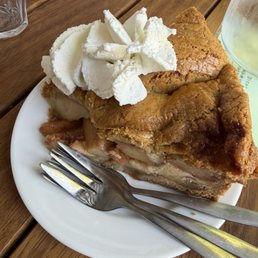 World famous apple pie with whip cream World famous apple pie with whip cream