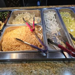China Star Buffet - Some of the items to be cooked to order.. Jalapeños, pineapple, minced garlic, cabbage, noodles, onions, celery